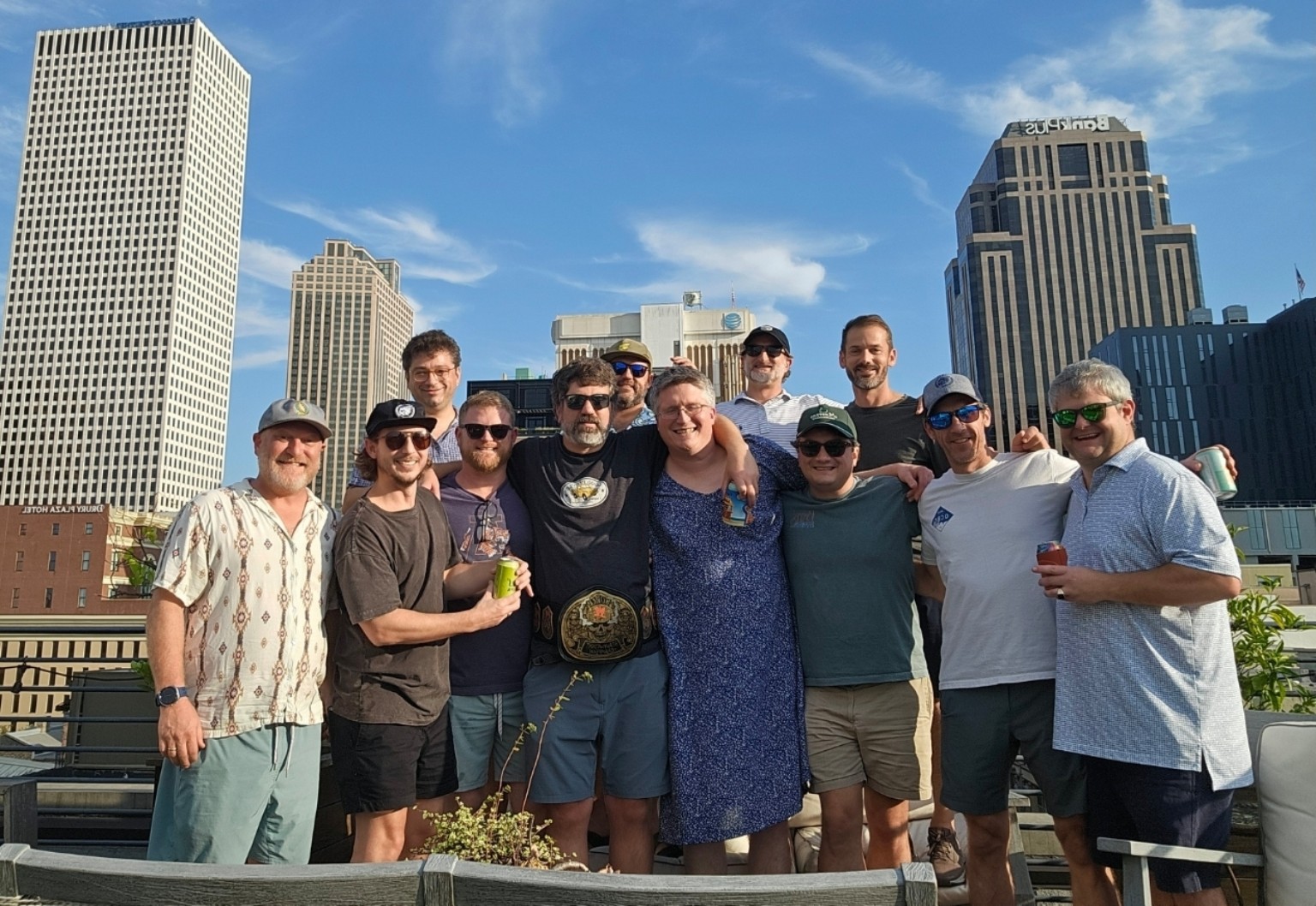 The twelve HFFL owners together on a New Orleans rooftop after the 2026 draft